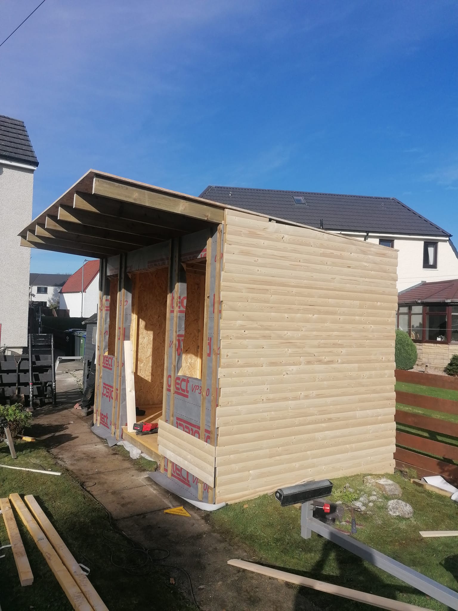 Summer house cladding installation - view 2