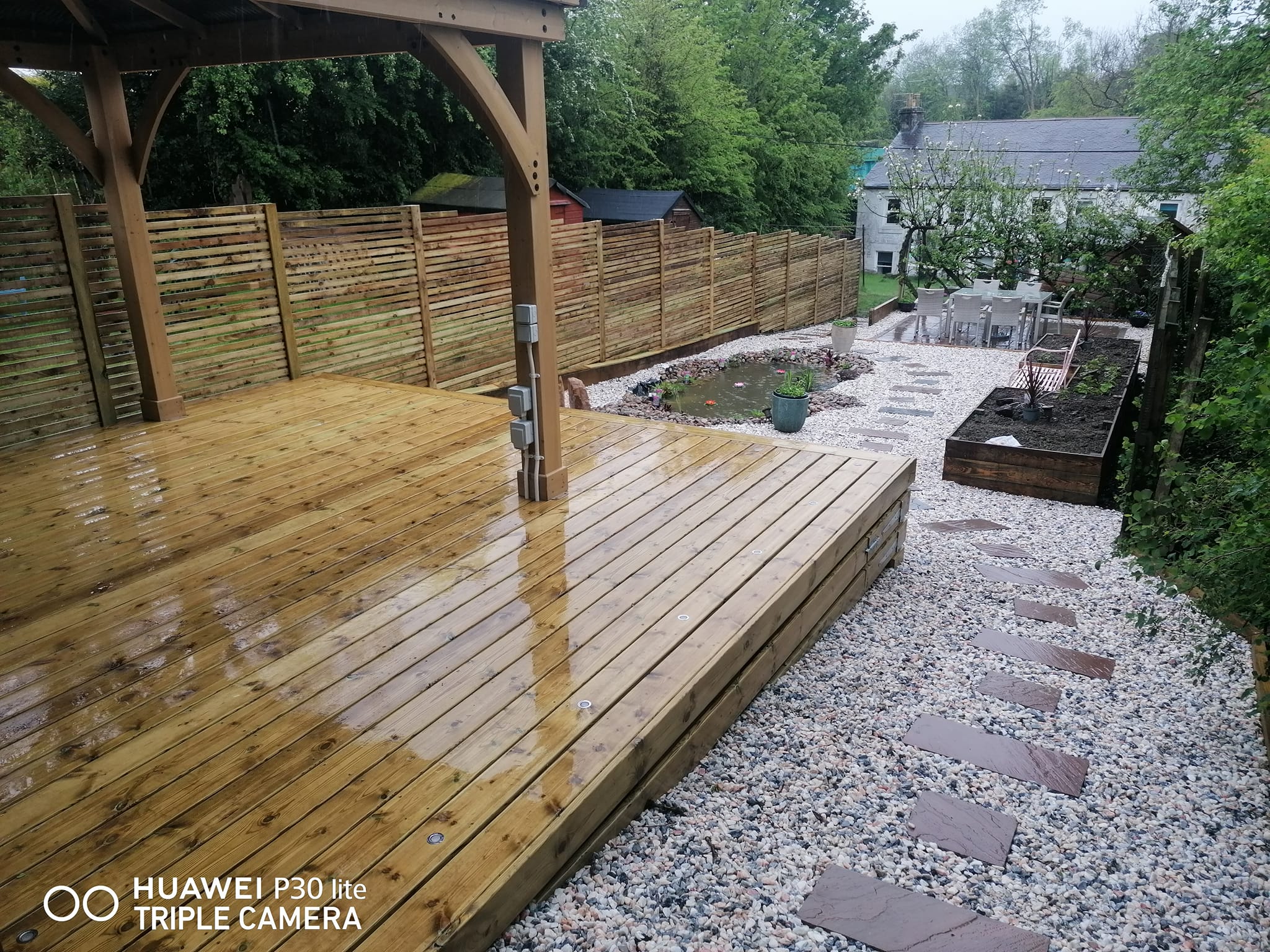 Completed garden with patio, pergola and venetian fence