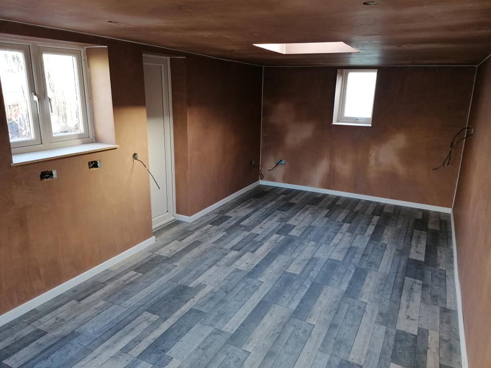Garden room interior with laminate flooring - view 1